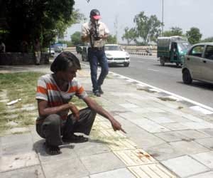 Man runs car over 13 people sleeping on divider in Delhi