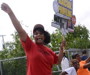 obama apeals to keep peace on a black youth murder.