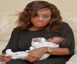three days old newborn feeds herself