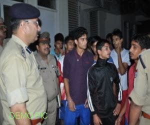 three men arrested for vulgure activities in car.
