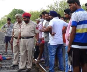 suicide by couple in front of train