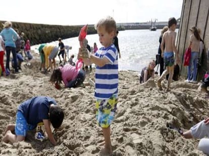 gold buiscuits hidden in sand