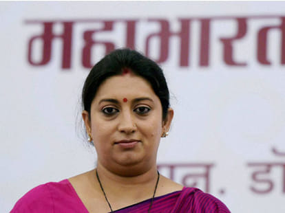 congress attack on smriti irani for relationship with rss.