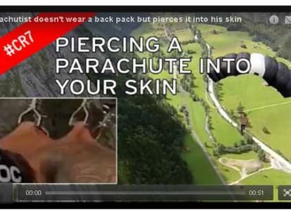 man hooks himself with parachute