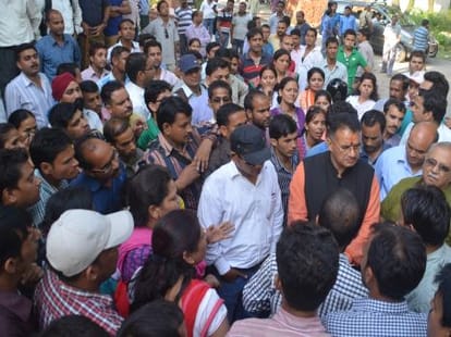 employees beaten by police.