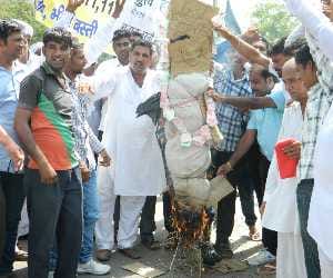 HUDA administrator blew effigy of farmers