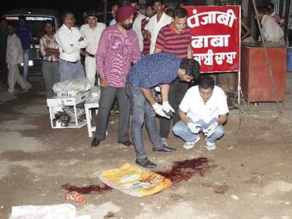murder of guest house owner by sharp ax