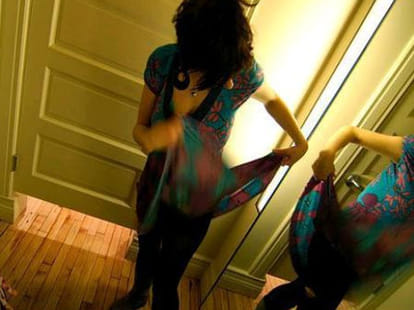dancer caught in camera in changing room.