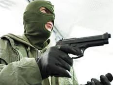 Traders on the pistol outstretched cart full of looted clothing