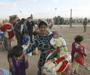 thousands people migrate from syria due to slamic state.