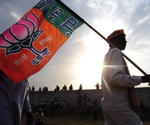 BJP spokesperson raises question on SP poster. 