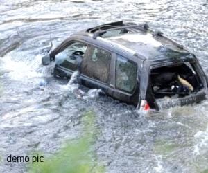 Car falls into ditch , two killed