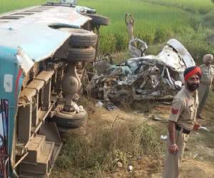 Bus-Car Accident, 4 Dead