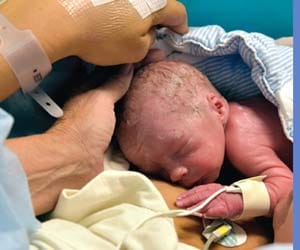 Newborn girl baby found in trash 