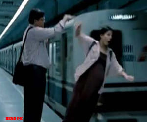 Delhi metro rail is to intalling doors on platform.