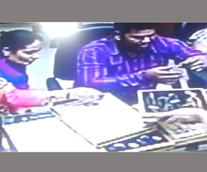 husband and wife cought in cctv.