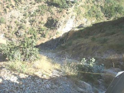car skidded off the road and rolled down a gorge in Himachal Pradesh