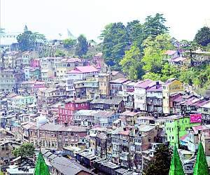 Rust Stain over the roofs of houses in shimla.