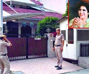 Furniture businessman shoots his wife, dead.