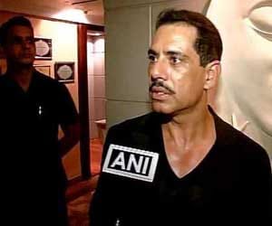 Robert Vadra abuse media reporter on land deal question.