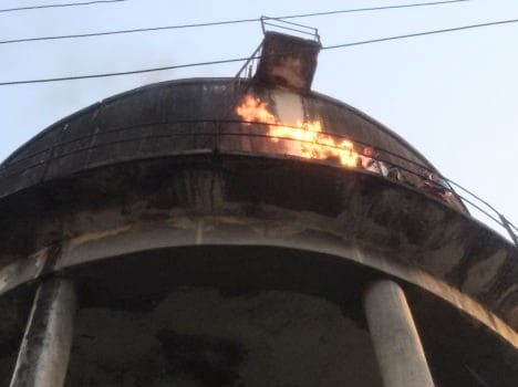 student union president caught fire on water tank.