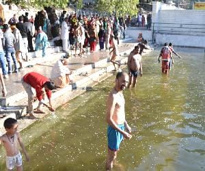 bath at renuka lake on purnima.
