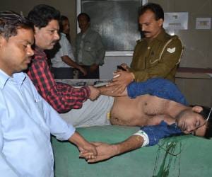 ADO agriculture and his son shot and looted in Faizabad.