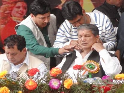 uttarakhand cm harish rawat action against state employee