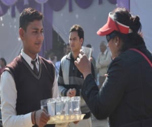 student become waiter in volleyball championship.