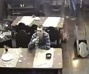 During armed mans firing, A Man was busy in his drinks
