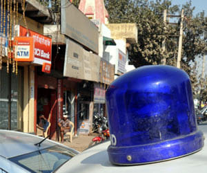  65 500 robbed by two men changing ATM card.
