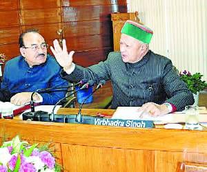 Cm virbhadra singh meeting with ministers regarding pong dam displaced people.