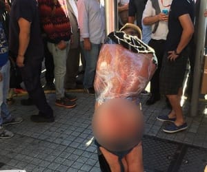 Thief stripped naked and clingfilmed to a lamppost