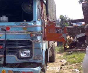 Woman killed in truck-car collision.