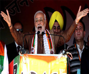 Why modi keep mum on article-370