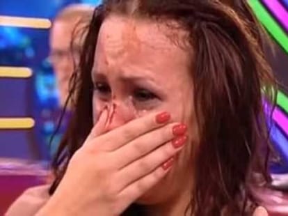 bikini clad woman got  a punch in tv game show