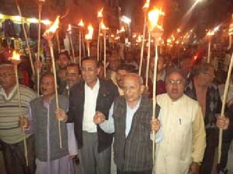 Traders took the torch procession