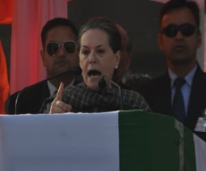 Sonia Gandhi greeting public after addressing a rally at Jammu