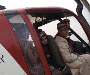 unique wedding, groom take helecopter to got his bride