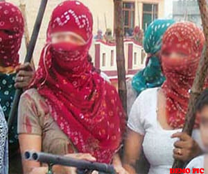 women guards herself in mirjapur village.