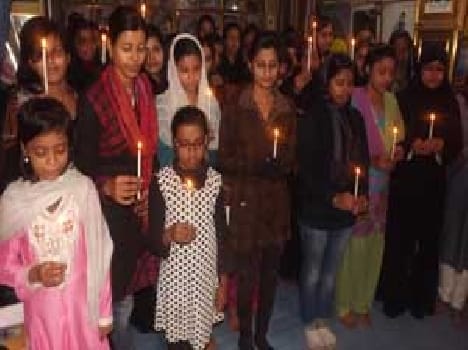 in tribute to martyrs students flames candles