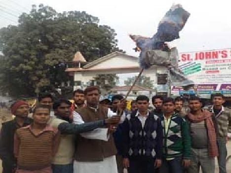 Congress Men fire  effigy of engineer.