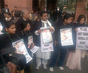 TMC mp's protest over mitra arrest