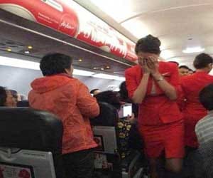 Chinese passenger threw hot water and noodles on AirAsia air hostess