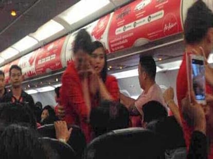 Chinese passenger threw hot water and noodles on AirAsia air hostess