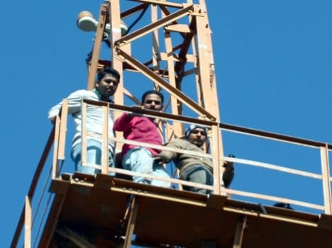 student leader climb on tower dehradun.