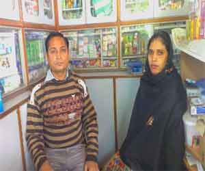Couple robbed at gun point a medical store.