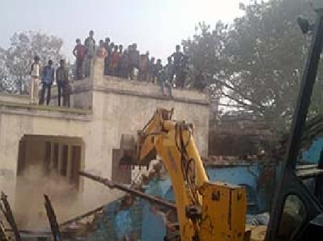 Bulldozers roared into Sirathu