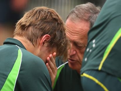 shane Watson shaken after being hit on helmet.