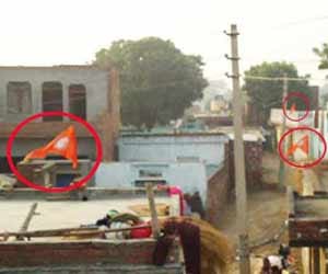 saffron flag on houses in agra etmadpur.